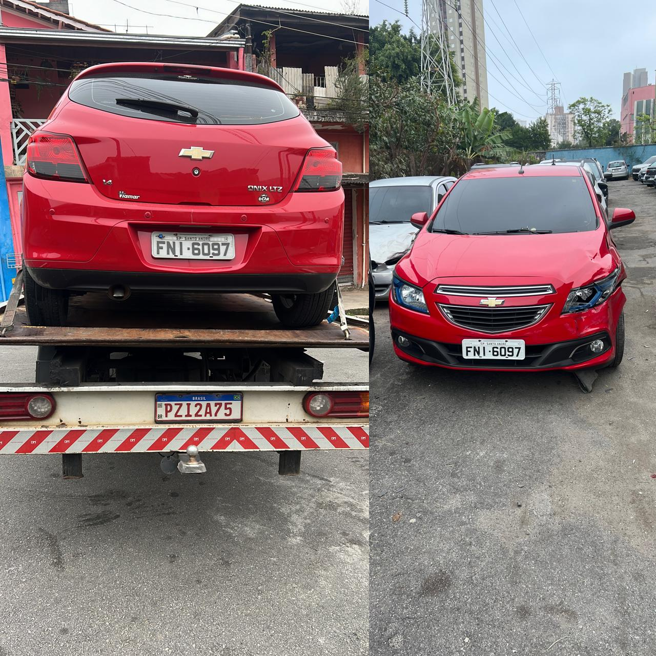 Caminhão-fazendo-serviço-de-reboque-carro-chevrolet